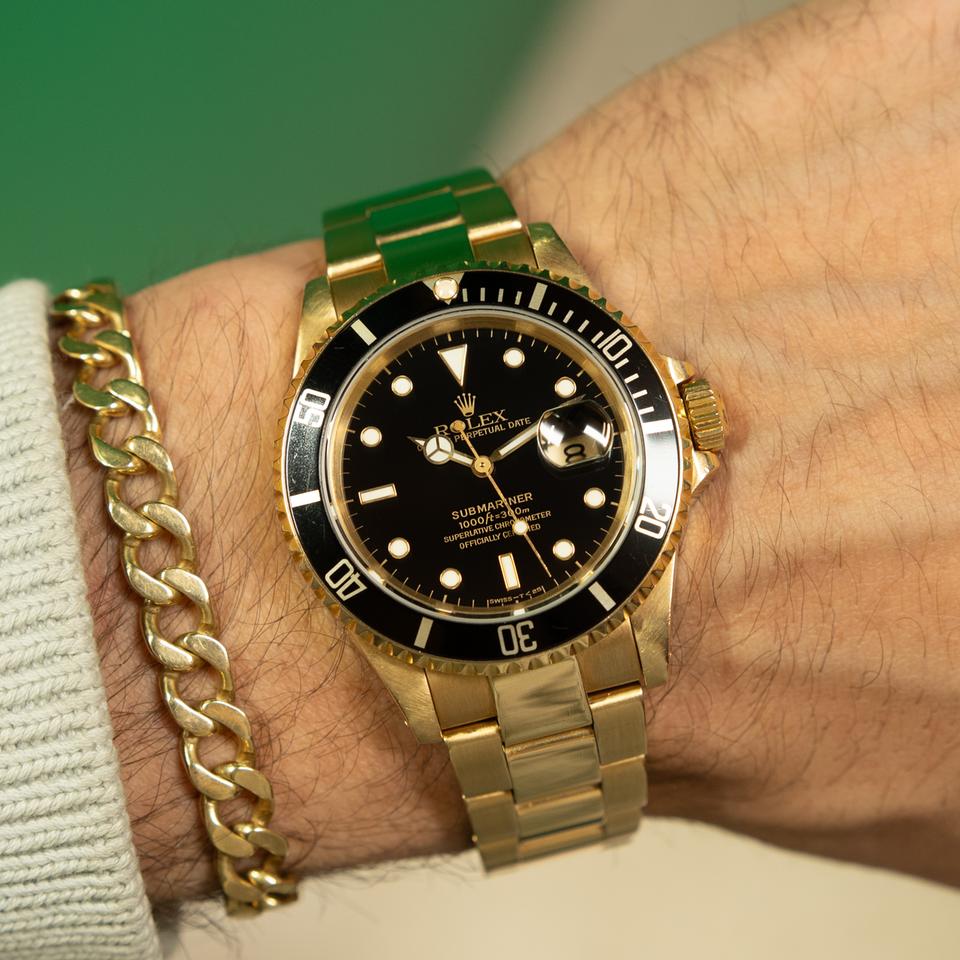 Rolex Submariner gold and black