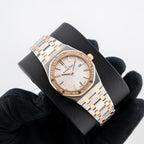 Audemars Piguet Royal Oak
Silver toned Dial Steel and Gold Diamond Bezel 33mm