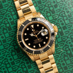 Rolex Submariner gold and black