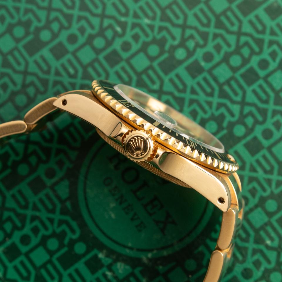 Rolex Submariner gold and black
