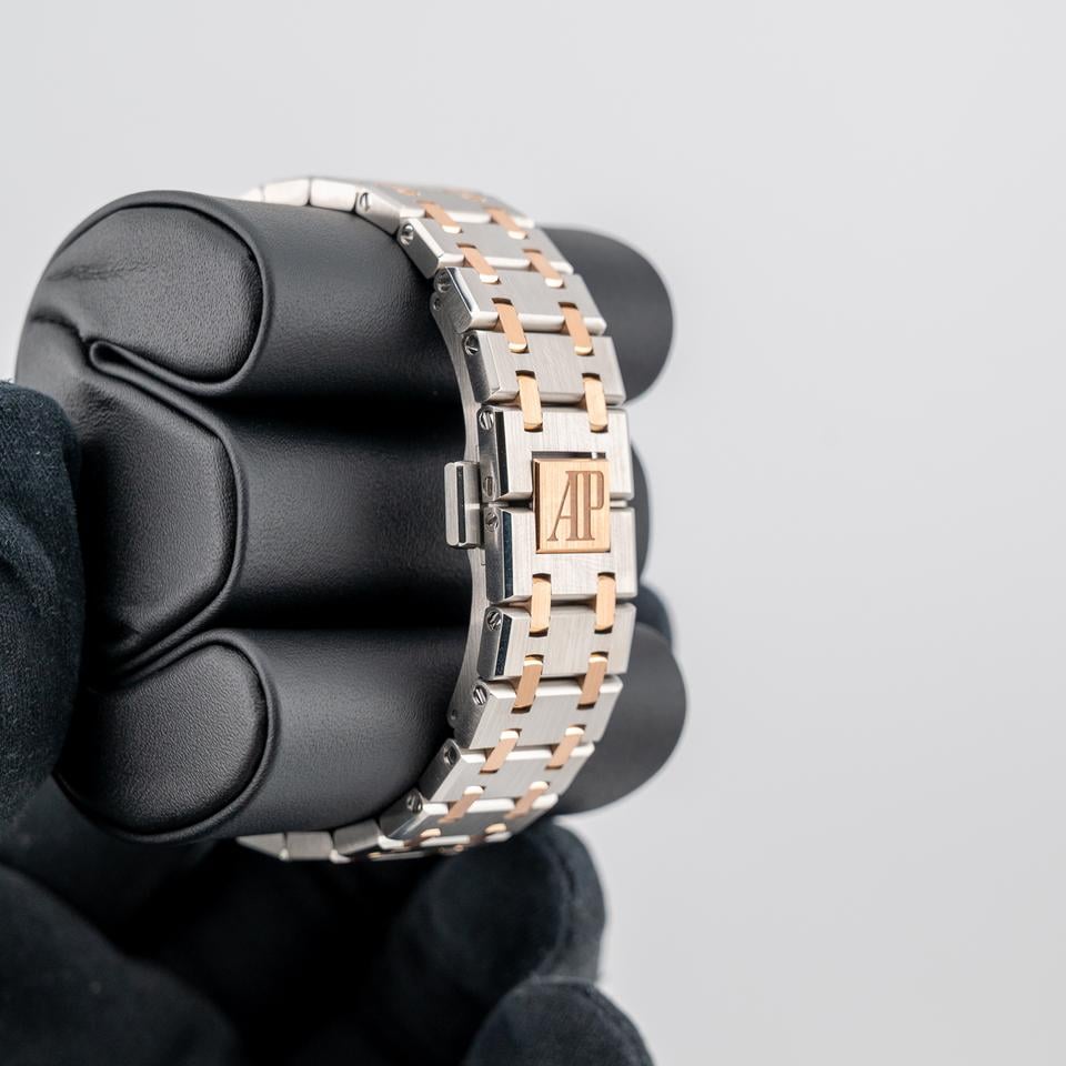 Audemars Piguet Royal Oak
Silver toned Dial Steel and Gold Diamond Bezel 33mm