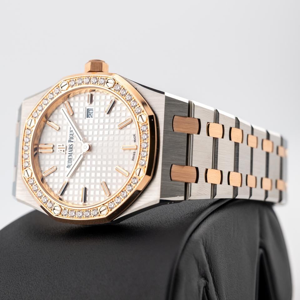 Audemars Piguet Royal Oak
Silver toned Dial Steel and Gold Diamond Bezel 33mm