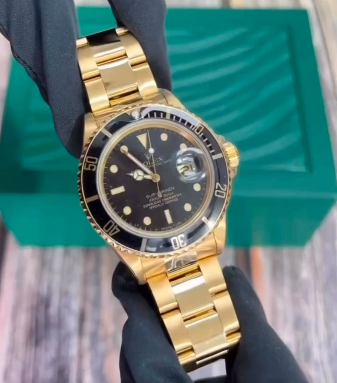 Rolex Submariner gold and black