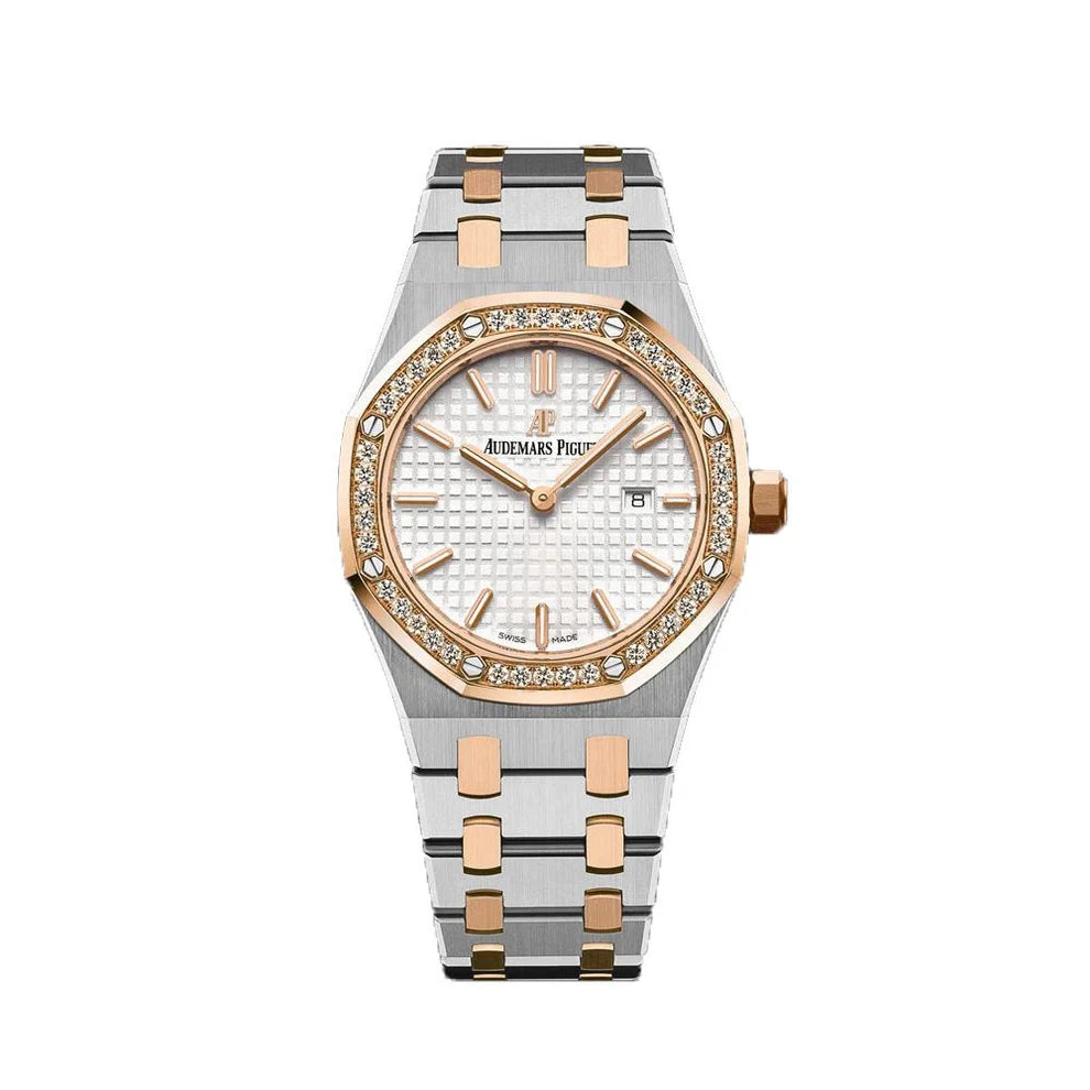Audemars Piguet Royal Oak
Silver toned Dial Steel and Gold Diamond Bezel 33mm